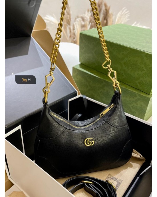 תיק גוצי' בכמה צבעים