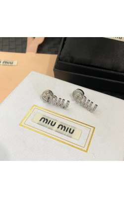 עגילי מיו מיו